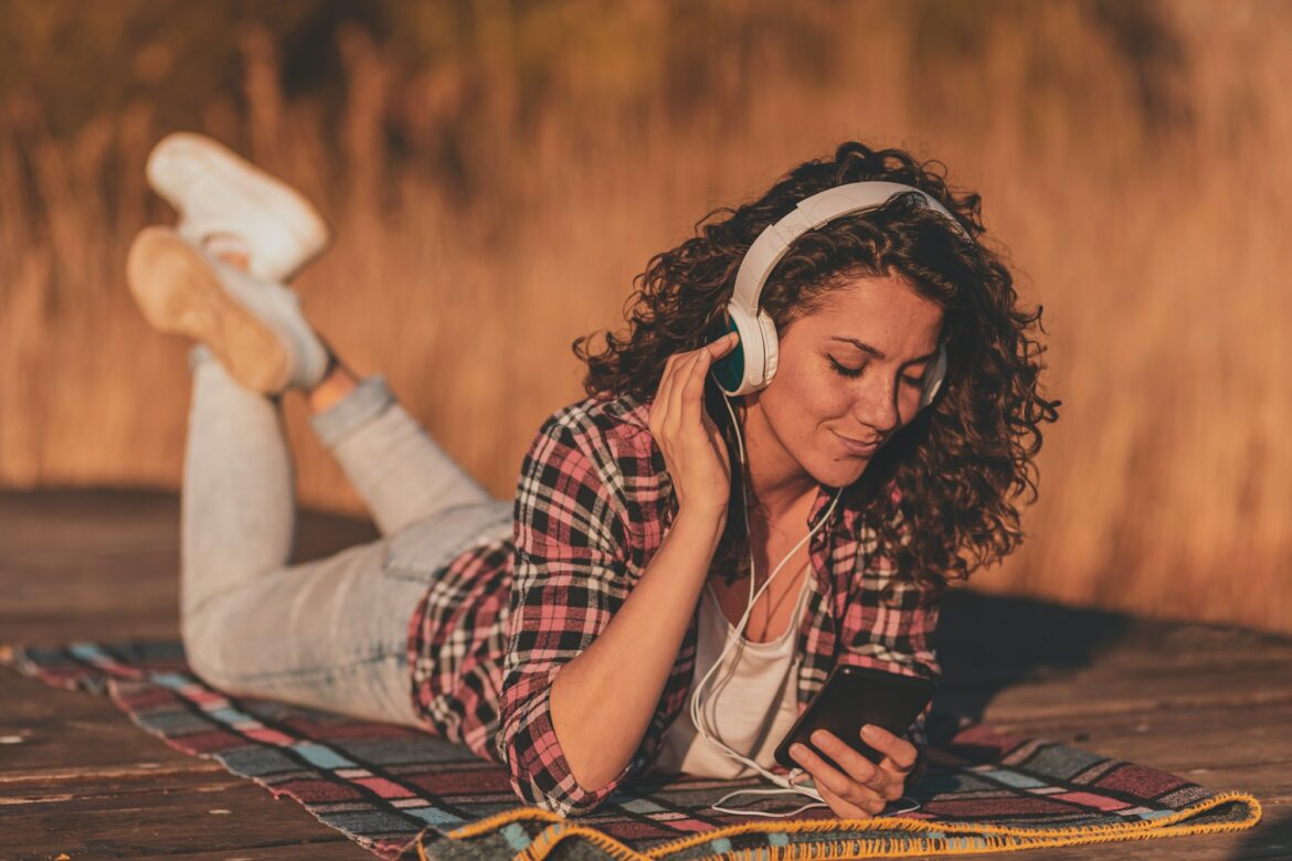 Woman listening to the music outdoors
